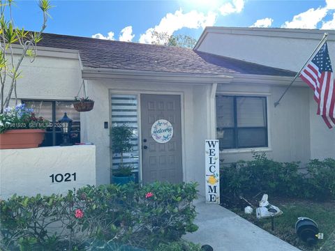 Photo of 1021 NW 79th Ave, Plantation, FL 33322 (MLS # A11981975)