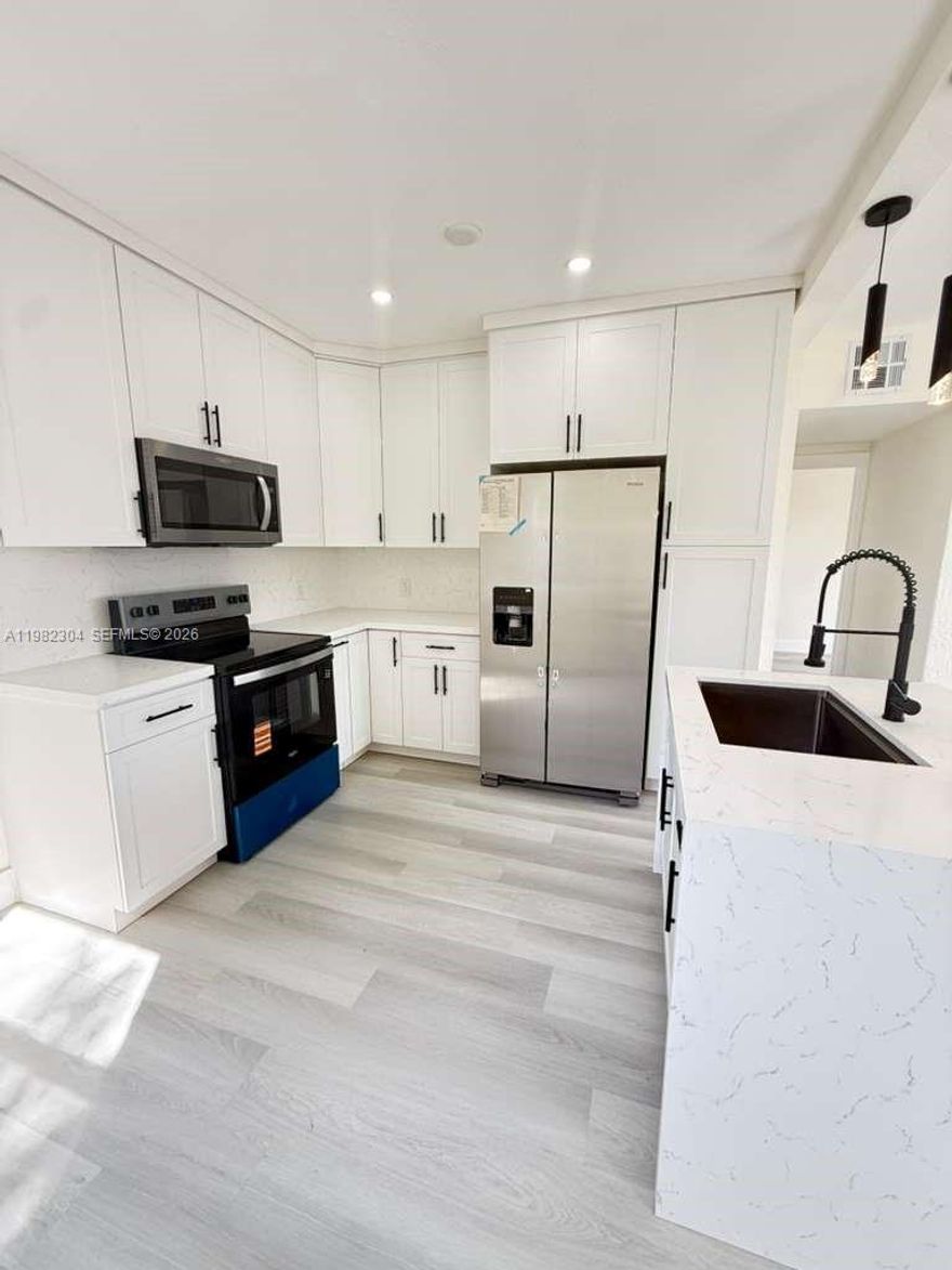 Seller contribution $10,000 ! fully remodeled 3-bedroom, 2-bathroom single-family home in Miami Gardens. This move-in ready property features brand-new flooring, a beautifully updated kitchen, and modern renovated bathrooms.  Enjoy a spacious backyard with plenty of room to build a pool or create the perfect outdoor entertaining area. Conveniently located near major highways, shopping, dining, and just minutes from Hard Rock Stadium, making it a great opportunity for homeowners and investors alike.