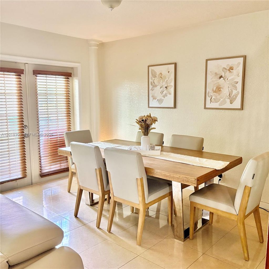Photo of 9020 NW 38th Dr #5, Coral Springs, FL 33065 (MLS # A12018301)