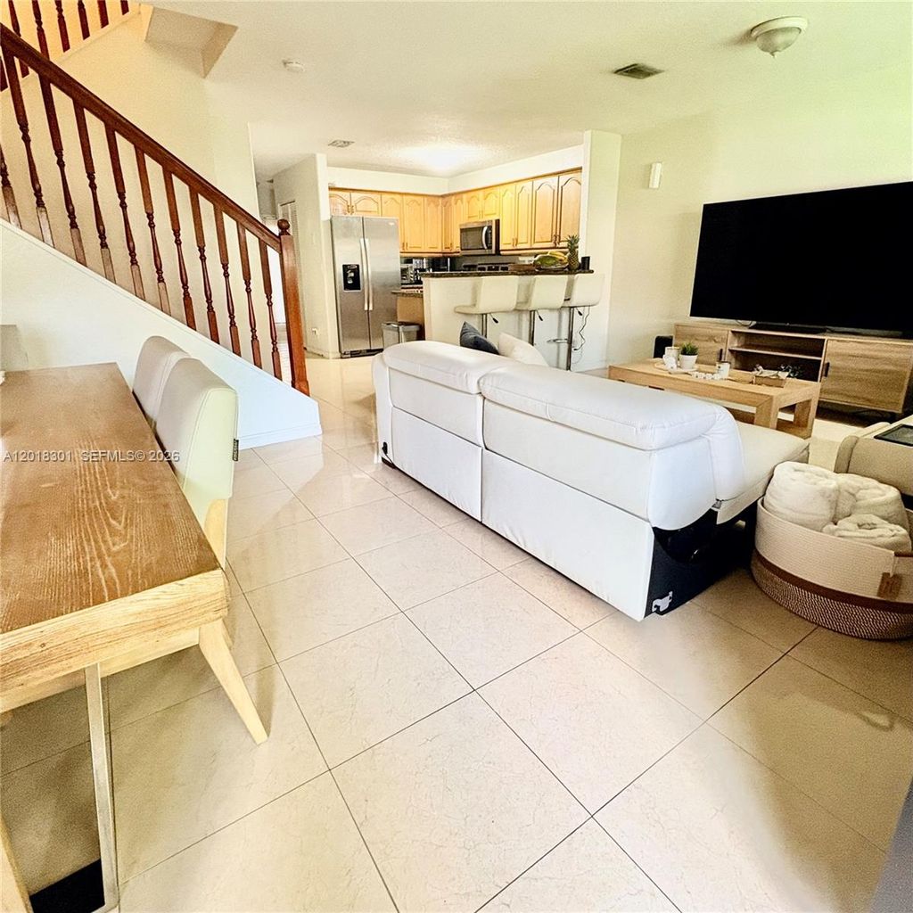 Photo of 9020 NW 38th Dr #5, Coral Springs, FL 33065 (MLS # A12018301)