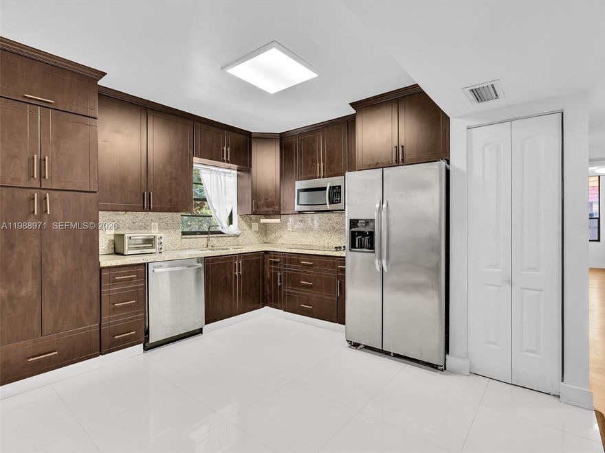 Spacious and beautifully maintained furnished 2BR/2BA residence in a gated waterfront community, just steps from the lake and one of two pools. The bright, open layout offers generous living spaces, abundant natural light, and a functional flow ideal for easy living. The primary suite includes a walk-in closet, and the unit features a large storage closet spacious enough to function as a mud room or small office.

The kitchen includes a stovetop (no oven), ideal for the minimalist who prefers light cooking and a cooler, low-maintenance home. Enjoy community amenities including a clubhouse available for meetings, parties, and receptions. Minimum 600+ credit score required per association.

Conveniently located near I-95 and the Florida Turnpike, with quick access to shopping, dining, and Hard Rock Stadium. Move-in ready and perfectly positioned for comfort, convenience, and lifestyle.