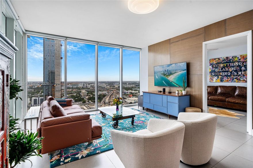Experience elevated living from this coveted 36th-floor 07-line residence at Ten Museum Park, where dramatic sunset and skyline views create a stunning backdrop to the ultimate lifestyle. This 2 -bedroom, 2.5 bath, 1,123 SF home features floor-to-ceiling windows, porcelain flooring, and a thoughtfully reimagined primary suite with a spa-inspired shower with Spanish tile, and a oversized walk-in closet. Both bedrooms offer full-wall privacy, creating a true retreat in the sky. Indulge in an unparalleled lifestyle with five dipping pools including a cold plunge, a state-of-the-art gym, the world-renowned Clinique La Praire Spa, and exclusive beach club membership in the trendy South of Fifth neighborhood. A rare opportunity to own a sophisticated urban sanctuary in the heart of Miami.