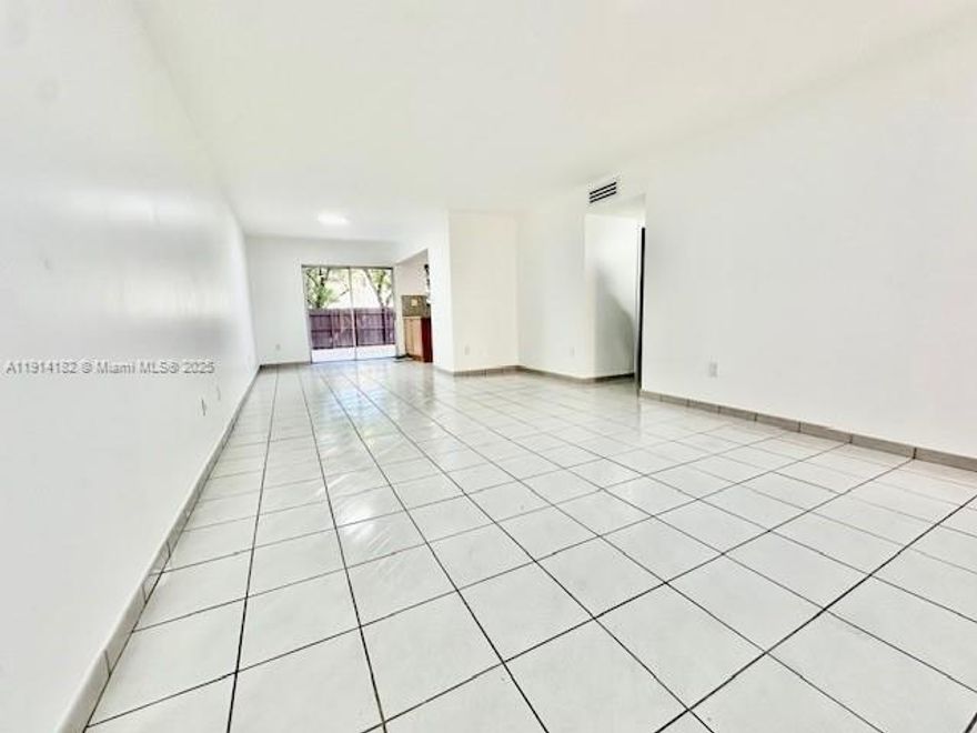 Don’t miss this opportunity to own a spacious & centrally located condo in a high-demand area. Great Turn-Key Investment Opportunity. Leased until 8-31-26 at $2,650.00 monthly. Renovated condo with large back yard. 3 bedrooms & 2 full bathrooms, on first floor. This bright & airy unit has a clean & inviting interior with tiled floor through-out. Granite countertops & Stainless Steel Appliances in kitchen. Updated bathrooms. Large fenced back yard with storage. Building Laundry facility on first floor next to unit. Condo is located in the heart of Sweetwater, just minutes from FIU, major expressways, & public transit. Enjoy the convenience of walking to nearby shopping centers, dining, & everyday essentials. Building upgrades include a new roof and impact-resistant windows