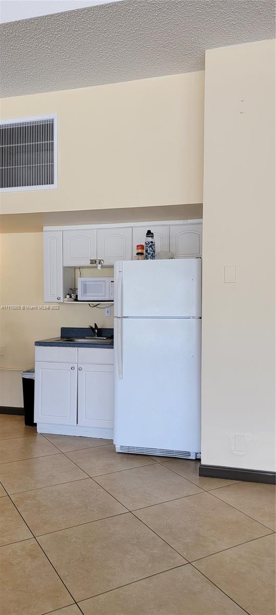 ENSENADA CONDO BLDG E-II - Residential Lease