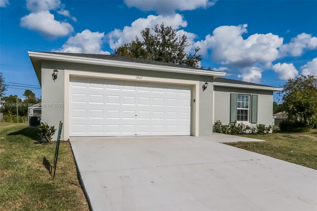 Photo of 1401 SW Goodman Ave, Port Saint Lucie, FL 34953 (MLS # A11306260)