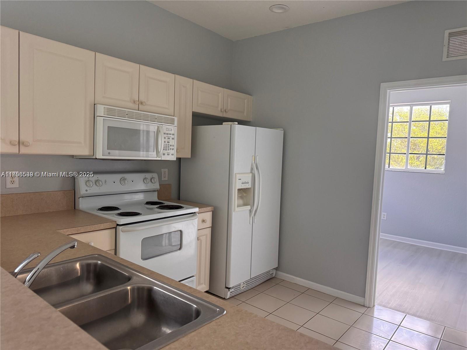 Gated Community with Resort-Style Amenities!Welcome to Marsh Harbour, where comfort meets convenience in this spacious 3-bedroom, 2-bathroom condo. This well-maintained 1,049 sq. ft.. Featuring, Bright & Airy Layout - Open-concept design with plenty of natural light, Spacious Kitchen - Equipped with all white appliances, ample cabinetry, and a breakfast bar, Private Balcony - Enjoy serene views and a relaxing outdoor space, Tile & Laminate Flooring - Easy maintenance and cozy comfort throughout, In-Unit Washer & Dryer - Convenient laundry setup, Assigned Parking - Plus ample guest parking available, .
.