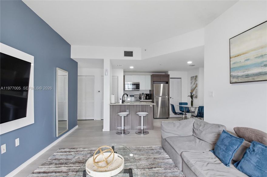 Experience the ultimate flexibility at the Emilia, one of Edgewater’s most coveted boutique buildings. This 2-bedroom, 2-bathroom residence is a dream for the savvy investor, offered fully furnished and ready for immediate short-term rental operation. Situated in a private 7-story building with no rental restrictions, this unit features a sleek, modern kitchen with premium Italian finishes and contemporary bathrooms. Step outside to a deep balcony where glimpses of the bay provide a picturesque backdrop for sunset cocktails. With its prime location just minutes from Wynwood, the Design District, and Miami Beach, this turnkey gem is perfectly positioned for high occupancy and seamless management.