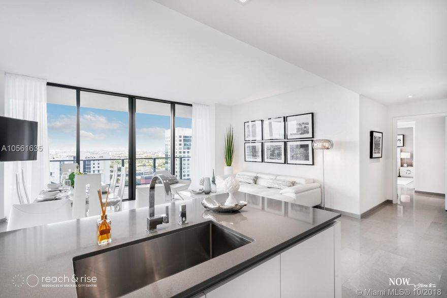 RISE is a 43-story tower designed by Arquitectonica. The building features an expansive, half-acre amenity deck which includes tropical gardens, barbecue grills, outdoor fitness areas and children's play area. Unit features den, floor-to-ceiling sliding glass doors, over-sized, fully finished walk-in closets in all master bedrooms and modern Italian cabinetry for both kitchens and bathrooms, with premium appliance packages inside every unit. SALES MODELS NOW OPEN; IMMEDIATE OCCUPANCY.