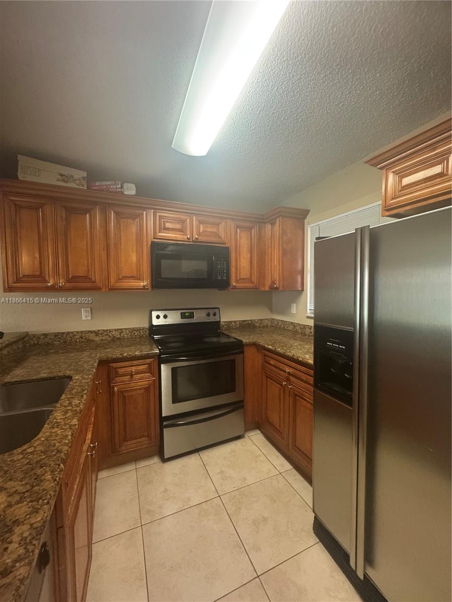 Spacious 3-bedroom, 2-bath condo for rent in the desirable Palm Beach Place community. This light and bright unit features an open living and dining area, a fully equipped kitchen, and a private balcony to enjoy the outdoors. The primary bedroom includes a walk-in closet and ensuite bath. Community amenities include a pool, fitness center, clubhouse, and tennis courts. Conveniently located near shopping, dining, major highways, and just minutes from downtown West Palm Beach.