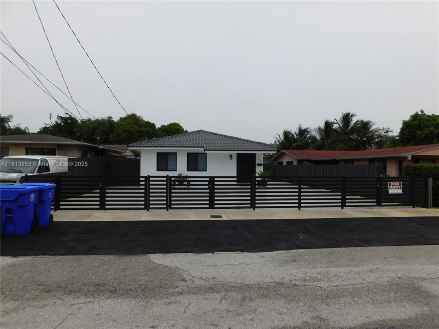 Excellent Location for this amazing 1 story rear unit Duplex. Completely remodeled with impact doors and windows all around. Very spacious rooms and large living/dining room combination. Gated property with 3 inside parking spaces, and a huge concrete backyard for any kind of activities. Completely remodeled kitchen with new appliances, and both bathrooms are remodeled as well. Just bring your toothbrush and furniture to move in. There's an inside laundry room with hook-up and the Tenant has the option to bring his washer/dryer. We present all Offers.