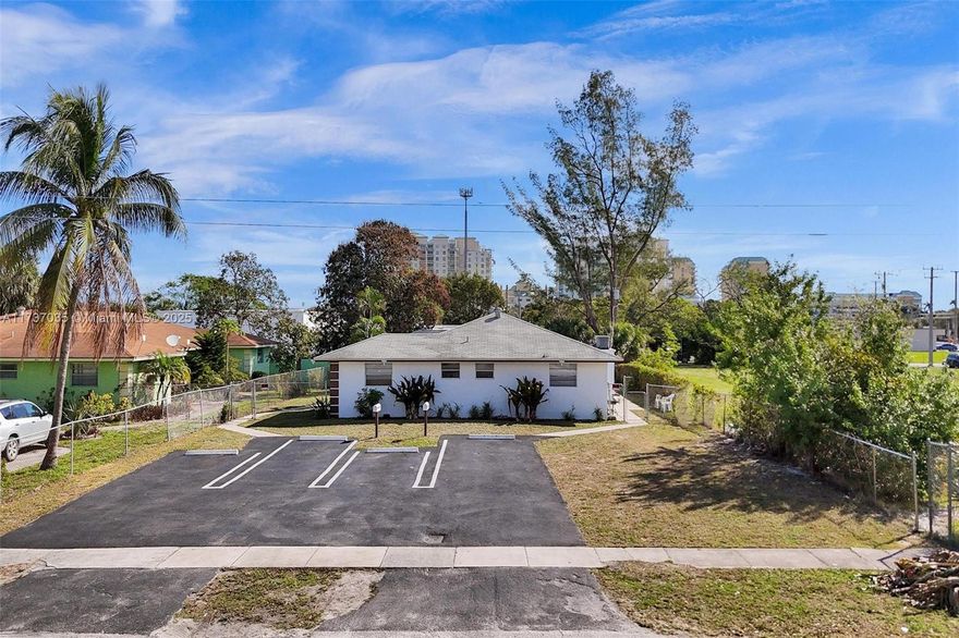 Prime Investment Opportunity! This spacious 1,250 sq. ft. duplex (each side with 2 bedrooms & 2 full bathrooms) is located directly across from the newly completed Boynton Beach City Hall & Library Complex and adjacent to a major redevelopment zone with new condos, apartments, and retail spaces underway. Just minutes from I-95, Ocean Avenue, and the beach, this property features updated kitchens, bathrooms, flooring, appliances, and central AC (all new in 2017), plus a re-asphalted and striped driveway (2022), fenced yard, shared laundry, and an extra-large lot with no HOA. Both units are currently rented at below-market rates with long-term tenants—a fantastic value-add opportunity!