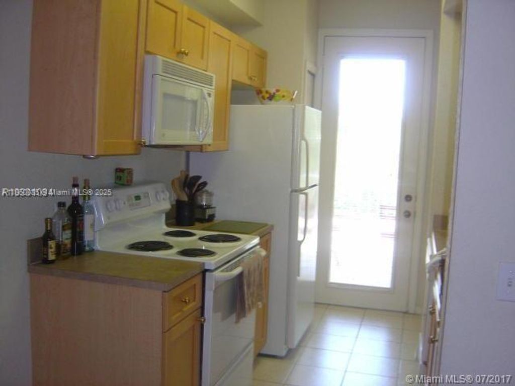 Photo of 11019 Legacy Ln #204, Palm Beach Gardens, FL 33410 (MLS # A11860085)