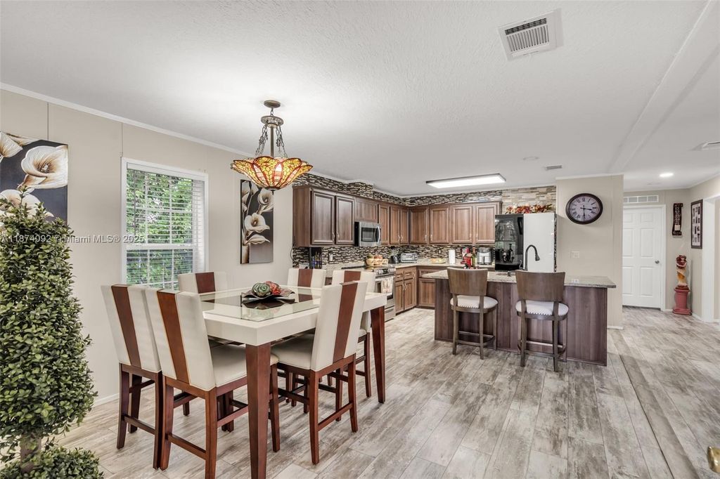 Photo of 12850 W State Rd #1 Gardenia Ln, Davie, FL 33325 (MLS # A11874092)