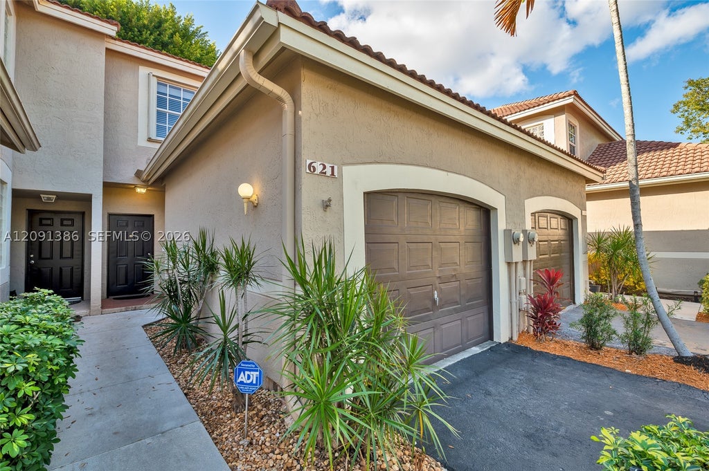 Photo of 621 Talavera Rd #621, Weston, FL 33326 (MLS # A12091386)