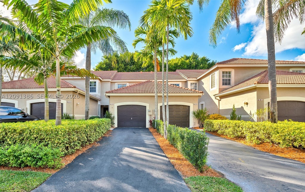 Photo of 621 Talavera Rd #621, Weston, FL 33326 (MLS # A12091386)