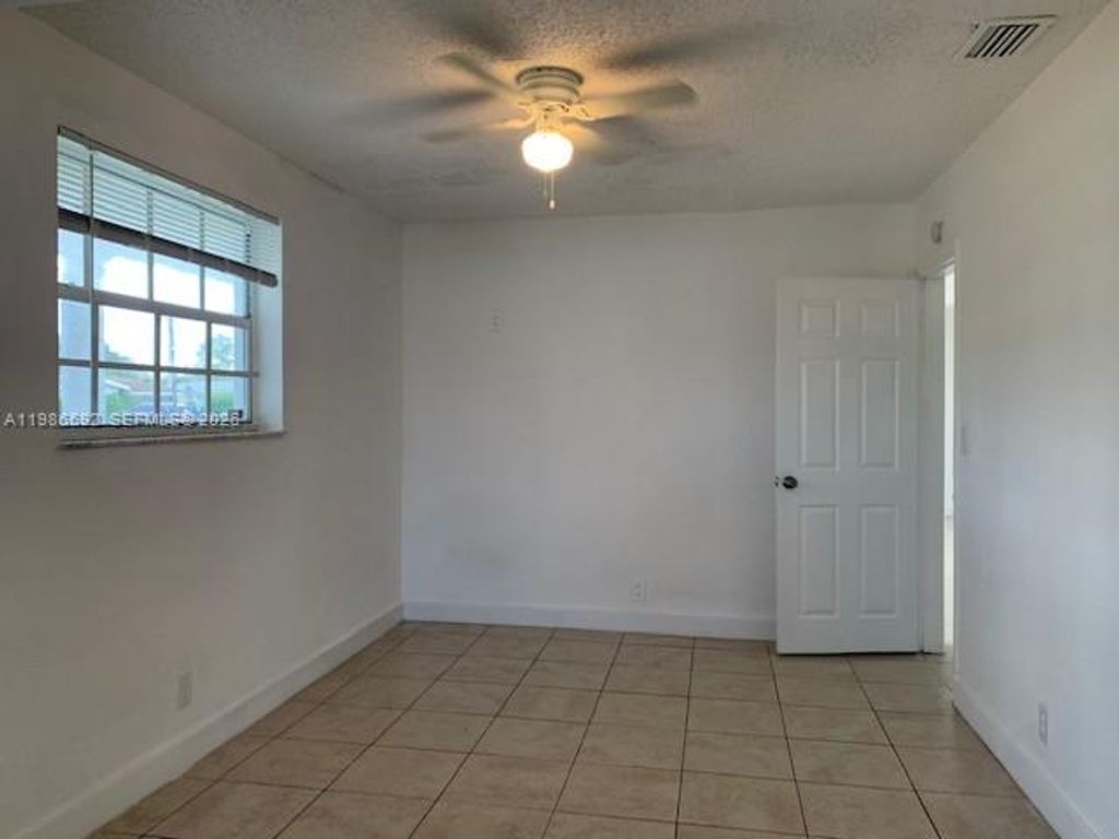 Photo of 4930 NW 13th St, Lauderhill, FL 33313 (MLS # A11986592)