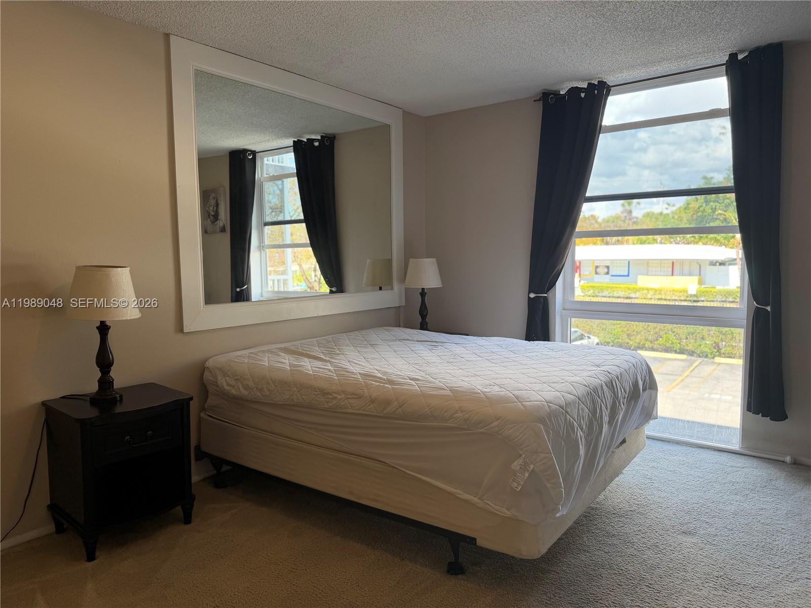 WOODSIDE APTS CONDO - Residential Lease