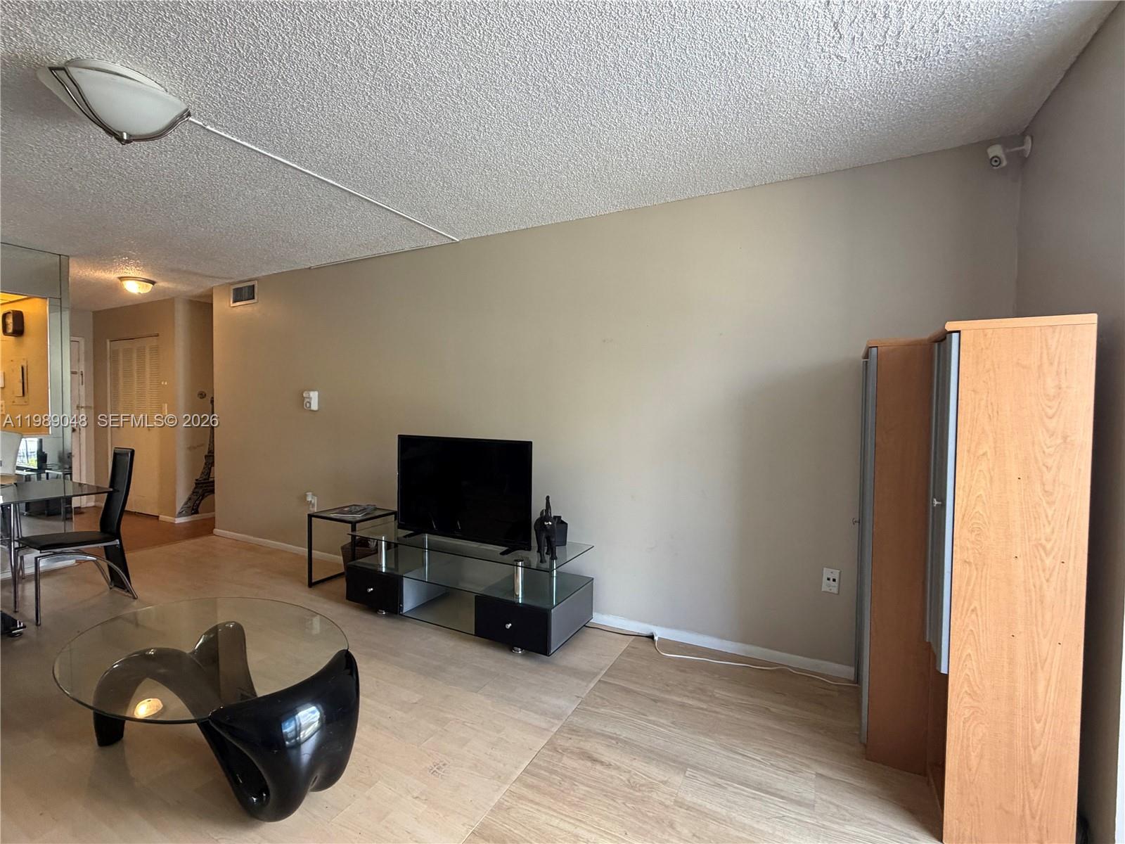 WOODSIDE APTS CONDO - Residential Lease