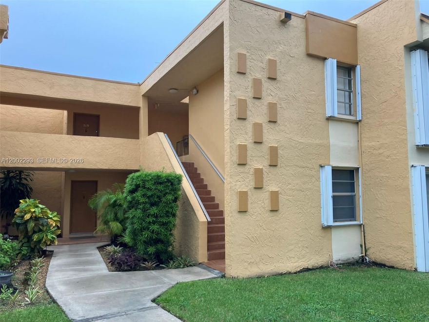 Centrally located. 2 bed / 1 bath unit on the first floor in gated South Winds Condo. Enjoy a peaceful community with pool and Security. Includes one assigned parking space plus many guest parking spaces. Low monthly association fee covering water, amenities, landscaping and more. No special assessments. 40 year Certification passed. Conveniently located near FIU, Walmart, restaurants and public transportation. Pet friendly. Property under a rental Lease until August 2026. Great for investors and homeowners. Easy to show. Please make your appointment through Showing Assist.