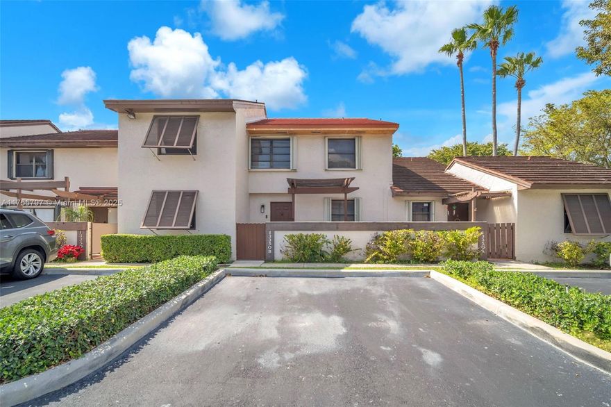 Now offered at $505,000 with a $10,000 SELLER CREDIT TOWARD BUYER'S CLOSING COSTS! This a 3/2 townhouse FHA approved and a rare to find in Kendall. Nearly 1,600 sqft with a bedroom and full bath downstairs, a new roof and AC, and an updated kitchen with wood cabinets and granite countertops. Bright open layout with plenty of natural light, spacious patio, accordion shutters, and a huge master bedroom with excellent closet space. Includes 2 assigned parking spaces in front, plus guest parking. Gated community with guard, tennis and handball courts, and one of the lowest HOA fees in the area. FHA-APPROVED and ELEGIBLE FOR LOW OR EVEN $0 DOWN PAYMENT. Prime location near A-rated schools, shopping, dining, and major roads. Easy to show!