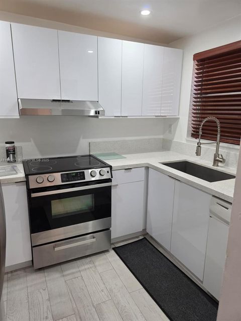 Photo of 1095 W 40th St #26, Hialeah, FL 33012 (MLS # A11919279)