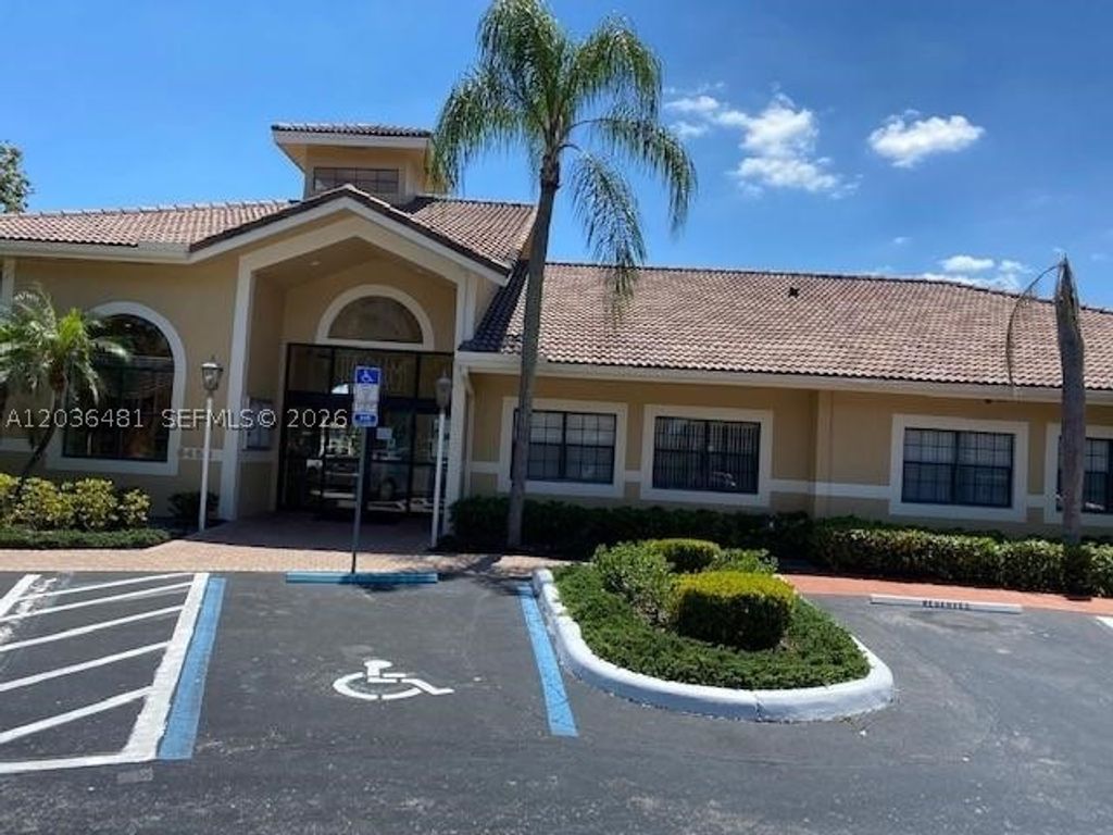 Photo of 300 W Palm Cir W #208, Pembroke Pines, FL 33025 (MLS # A12036481)