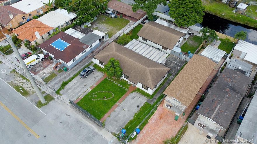 PRICED TO SELL!!! Waterfront Triplex on a big 11,250 sqft double lot. Roof and Central A/C in all units were replaced in 2019. Updated 3/2 in the back with big patio and entertainment area. Centrally Located between Flagler & 8 Street. 5 Blocks from Palmetto Expressway. One of a kind. Won't last!!! SOLD "AS IS" WITH RIGHT TO INSPECT.