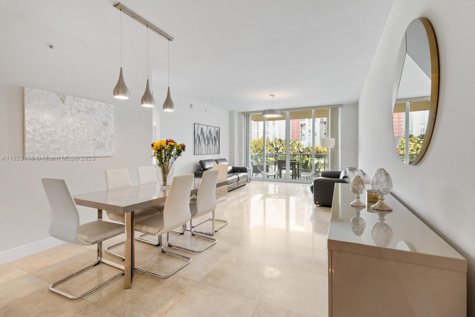 Step inside this exquisite two-bedroom, 2.5 bathroom apartment, throughtfully furnished and fully equipped, nestled in the heart of Aventura. Enjoy captivating marina vistas from the master & living area. You'll have acess to one designated parking spot and valet parking is also available. The building offers an abundance of amenties, including multiple pools , a clubhouse, a spacious party room, a sauna, jacuzzi, a cutting-edge gym w/ fitness classes, a marina, walking paths,a BBQ area, and even a paddleboard rak area. Convenience is key here, as you can easily walk to fine dining, shopping, entertainment, and more. You're just next door to a water park and a vibrant community park. Aventura boasts some of Miami's finest public schools, ensuring an excellent education for your family
