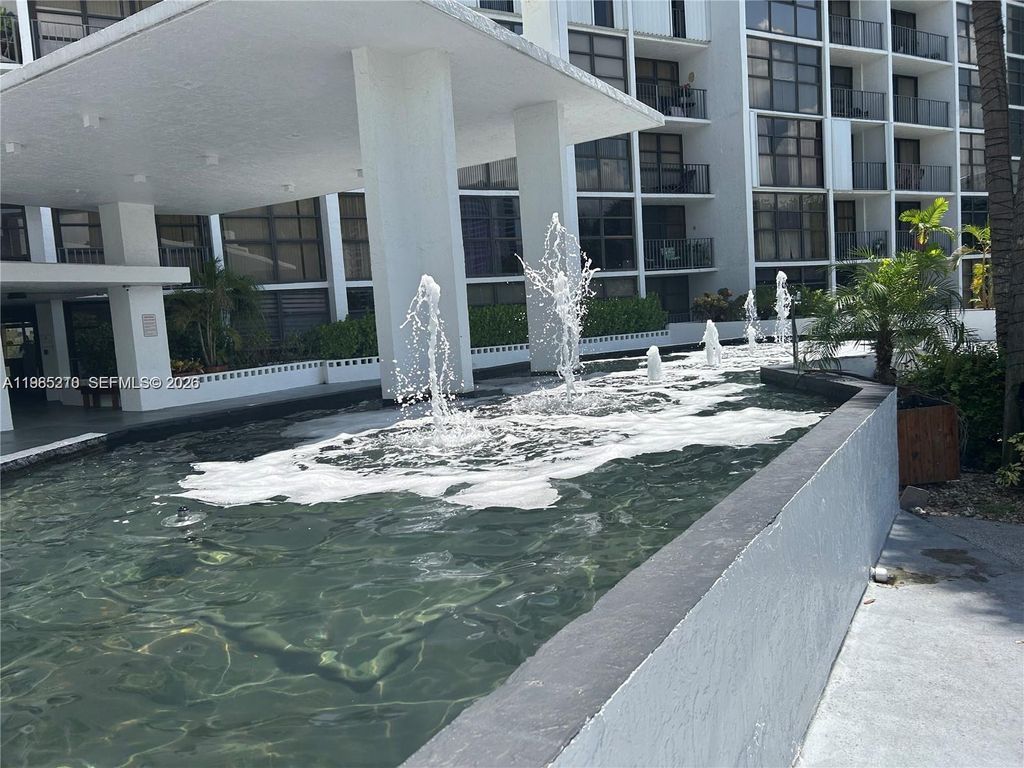 Photo of 400 Leslie Dr #308, Hallandale Beach, FL 33009 (MLS # A11985210)