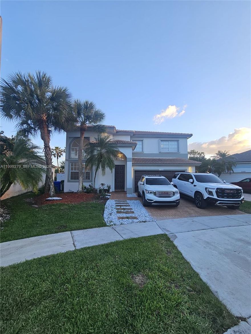 Beautifully renovated 4-bedroom, 3-bath home located in a desirable Pembroke Pines area. This property features new flooring throughout, a modern kitchen, and fully updated bathrooms. The layout includes one bedroom and a full bathroom on the first floor, ideal for guests or multi-generational living. Enjoy a fenced backyard, perfect for added privacy and outdoor enjoyment. The community offers excellent amenities including a clubhouse, swimming pool, gym, tennis courts, and basketball courts. Move-in ready and perfect for families seeking comfort, security, and lifestyle.