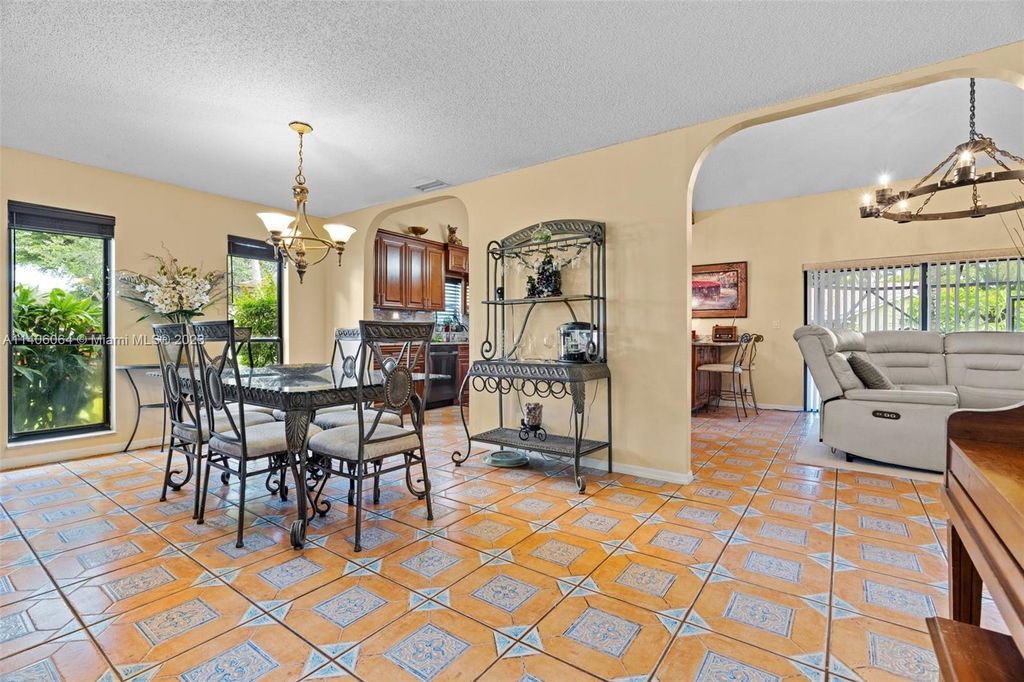 Photo of 7010 NW 39th Pl, Coral Springs, FL 33065 (MLS # A11406064)