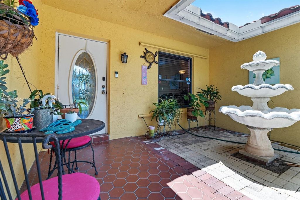Photo of 7010 NW 39th Pl, Coral Springs, FL 33065 (MLS # A11406064)