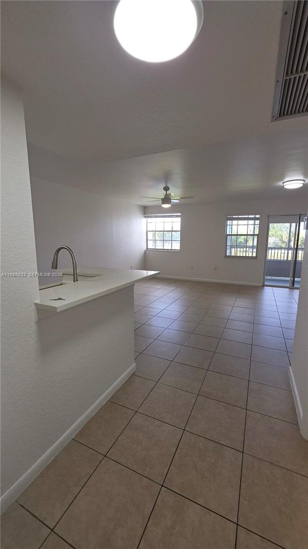 Photo of 2881 N Oakland Forest Dr #210, Oakland Park, FL 33309 (MLS # A11985832)