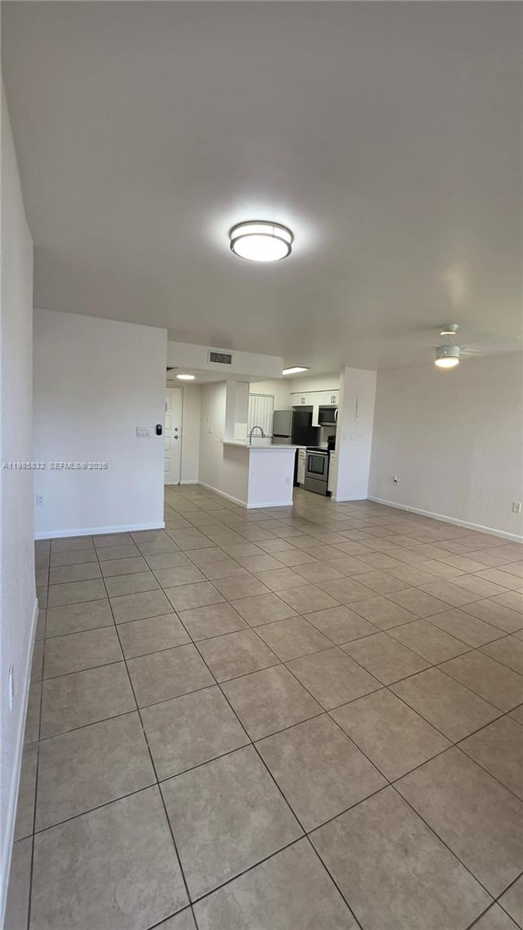 Photo of 2881 N Oakland Forest Dr #210, Oakland Park, FL 33309 (MLS # A11985832)
