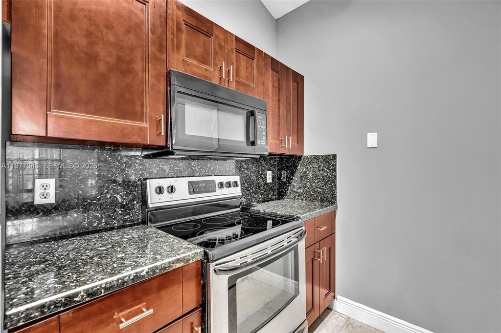 Photo of 2881 N Oakland Forest Dr #212, Oakland Park, FL 33309 (MLS # A11977946)