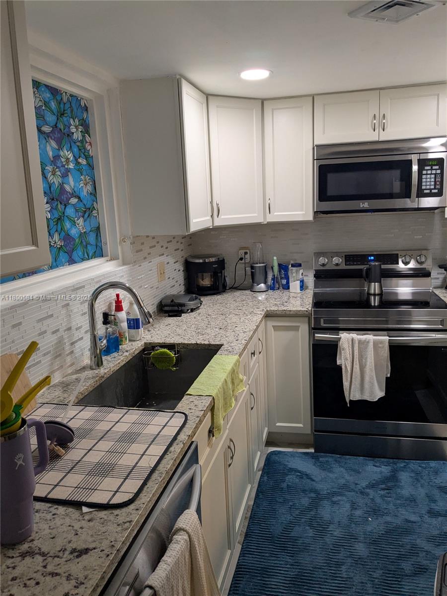 LAURELS AT MARGATE CONDO - Residential