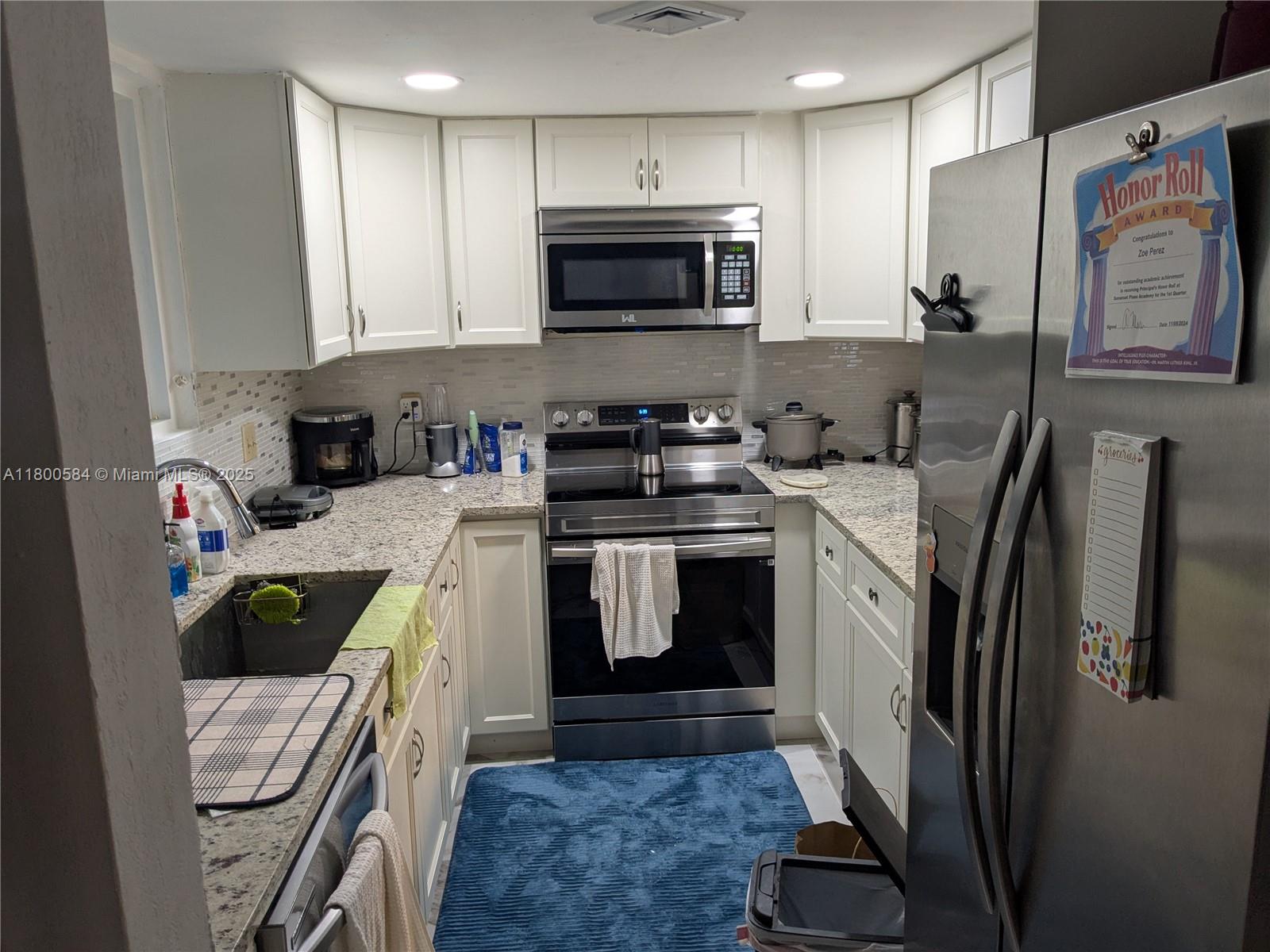 LAURELS AT MARGATE CONDO - Residential