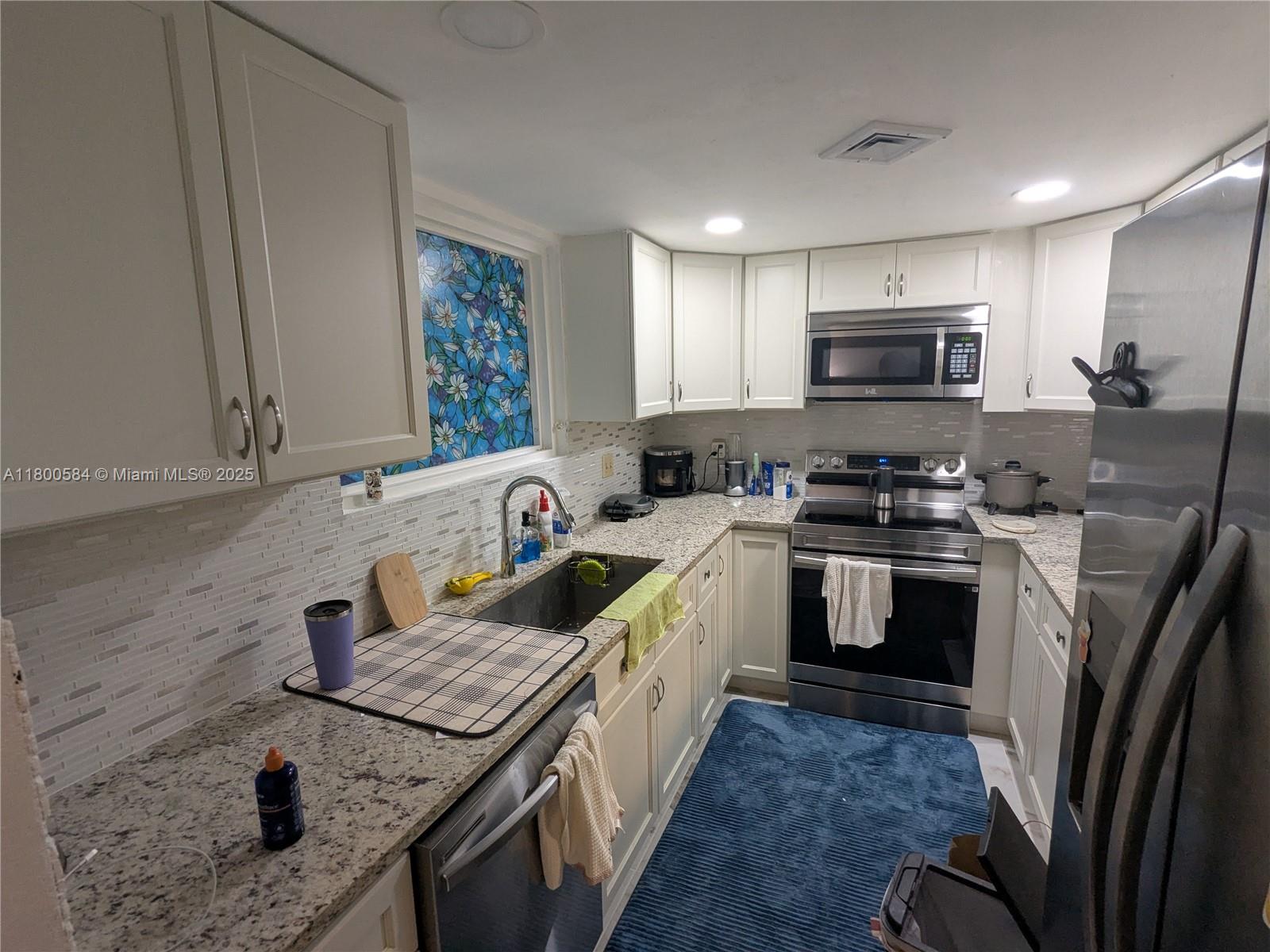 LAURELS AT MARGATE CONDO - Residential