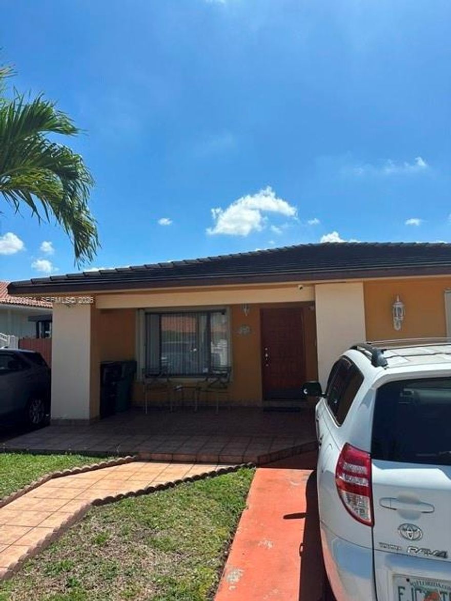 Beautiful home located in the highly desirable West Hialeah Area. This Well-maintained property features a spacious layout, nice kitchen, comfortable living areas. and plenty of natural light throughout. Enjoy a private patio area perfect for entertaining and family gatherings. Conveniently located near major highways, shopping centers, restaurants, schools and parks. Excellent opportunity for homeowners. also, a side Carport that fits about 3 cars Also has Outdoor Cameras Roof is only 7 Years old And No HOA.