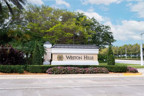 Photo of 2621 Oakbrook Ln, Weston, FL 33332 (MLS # A12018498)