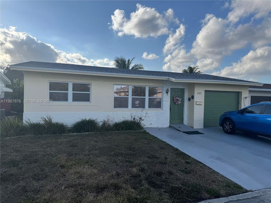 55+ community beautiful home with large florida room,Large canal in the back,home has open kitchen with tiled floors, new roof newer windows and large living areas.