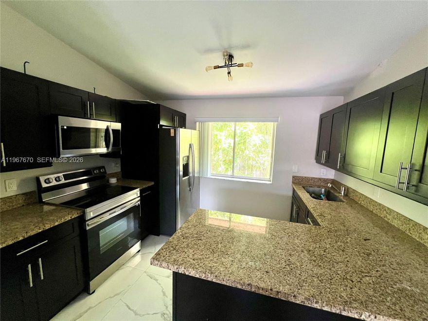 Beautifully remodeled 2-bedroom, 2-bath condo in a prime central location in Doral. This move-in-ready unit features porcelain tile floors throughout, fully renovated bathrooms, stainless steel appliances, and granite countertops. Bright, functional layout with excellent natural light.

Centrally located near major highways, shopping centers, restaurants, schools, and everyday conveniences—ideal for commuters. Excellent opportunity for first-time buyers or investors. Property can be sold with a tenant in place, making it a great option for immediate rental income. Strong demand area with long-term value. Easy to show—won’t last!