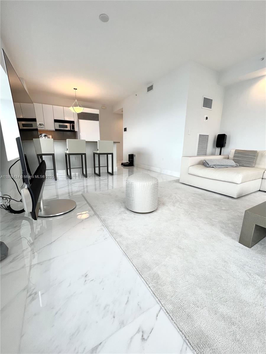 MILLENNIUM TOWER CONDOMIN - Residential Lease