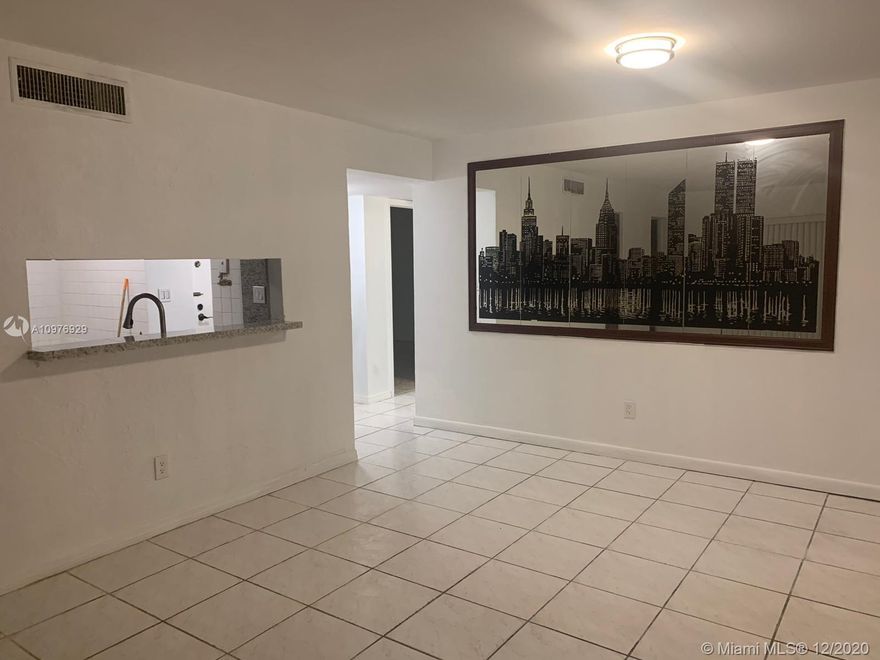 Beautiful 3 bedrooms and 2 bath !! All tile floors, new granite countertops, updated bathrooms, washer and dryer inside the apartment, freshly painted