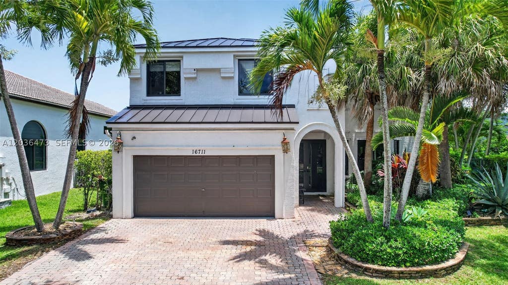 Photo of 16711 SW 14th St, Pembroke Pines, FL 33027 (MLS # A12036473)