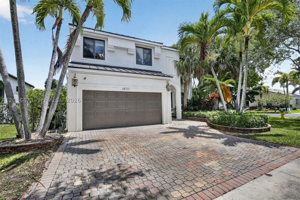 Photo of 16711 SW 14th St, Pembroke Pines, FL 33027 (MLS # A12036473)