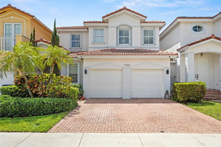 Exquisite 4-bedroom coach home showcasing a thoughtfully designed and elegant layout. The first floor features a private bedroom with a full bath, ideal for guests or multigenerational living, while the second level offers three spacious bedrooms designed for comfort and privacy. Step outside to a beautifully appointed patio, perfect for enjoying serene mornings and relaxing afternoons. Ideally located in a highly sought-after neighborhood with top-rated A schools, and just moments from the Turnpike, premier shopping, fine dining, and major conveniences. Only minutes from Miami International Airport, offering the perfect balance of luxury, comfort, and accessibility. A truly exceptional opportunity.