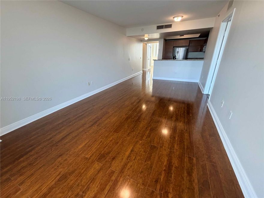 Desirable 2 Bed + 2 Bath and a Den apartment, spacious Kitchen, w/cabinets, stainless appliances. granite counter tops, windows shades, wood floor and very spacious master bedroom. A must see unit with 2 well located parking spaces.