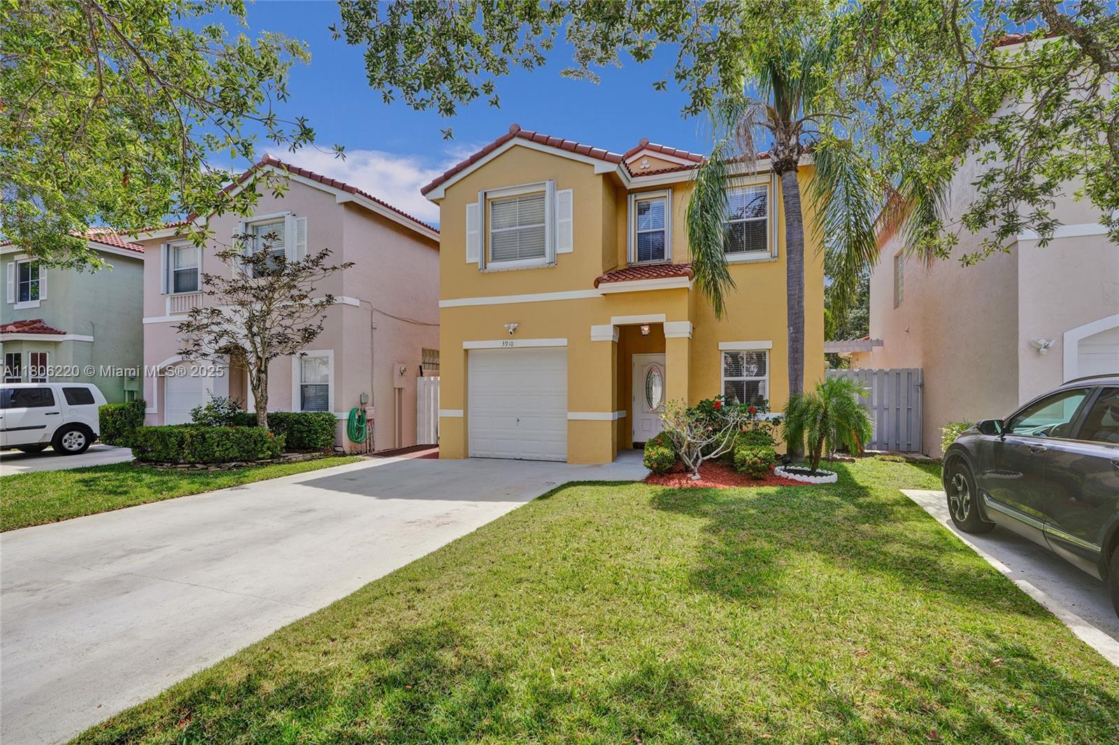 Welcome to this beautiful single family home located in The Park of Rock Creek. This is a small enclave of homes in a gated community with their own community pool. Pride of ownership shines throughout this home that features 3 bedrooms with 2 1/2 bathrooms and a 1 car garage. The first floor has ceramic tile. The second level including the stairs features high end engineer wood laminate flooring. Volume ceilings on the first floor and cathedral ceiling in the master bedroom. The roof and central a/c were replaced in 2024! All bedrooms are on the top level. The master bathroom features a separate shower plus a roman tub and double sinks. The kitchen has been updated with wood cabinetry and granite countertops. Impact glass and doors on the 1st floor and accordions on the 2nd floor.