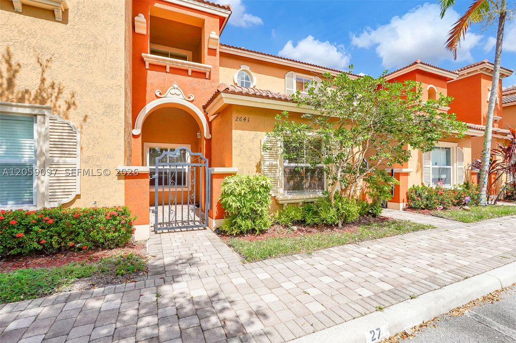 Photo of 2641 SW 120th Ter #205-2, Miramar, FL 33025 (MLS # A12059097)